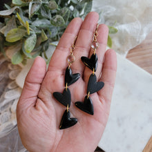 Load image into Gallery viewer, Long Triple Black Heart Dangles with Crystal
