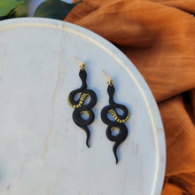 Load image into Gallery viewer, Black and Gold Snake Earrings

