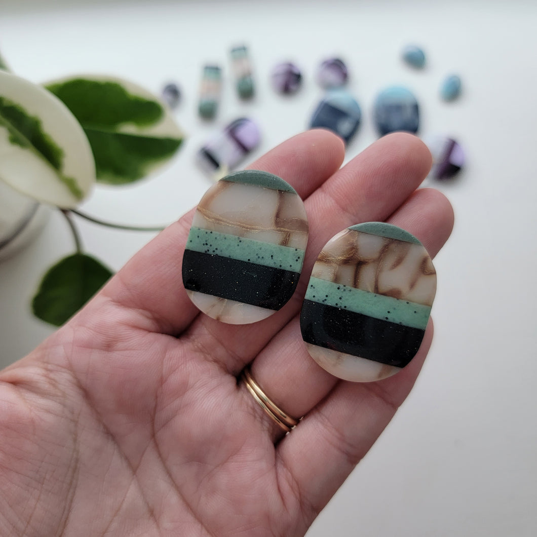 Stone Statement Studs in Green Oval